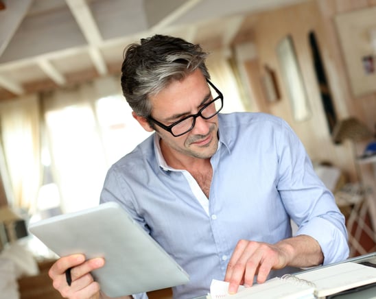 Handsome businessman with eyeglasses working from home-3